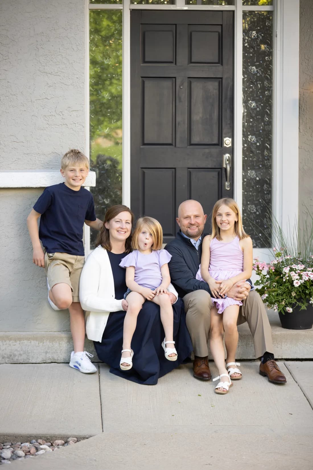 Wes Rogers and his family on their Kansas City front porch